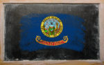 Flag Of Us State Of Idaho On Blackboard Painted With Chalk
